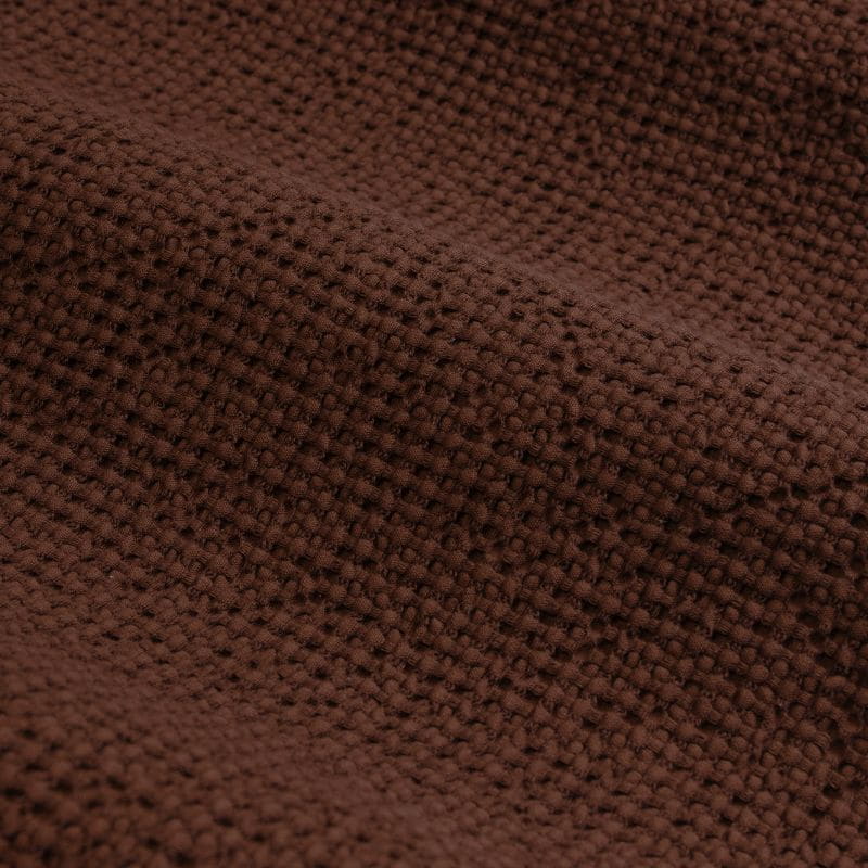 Close-up details of the brown quilt cover set, featuring a vintage cotton design with textured waffle for added depth and warmth.