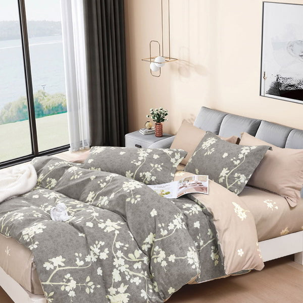 A tranquil cover set showcasing a bed with the elegant Ardor Amesbury Natural Quilt Cover Set and a bright window.