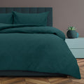 A deep teal quilt cover set adding elegance and comfort to your bedroom retreat.