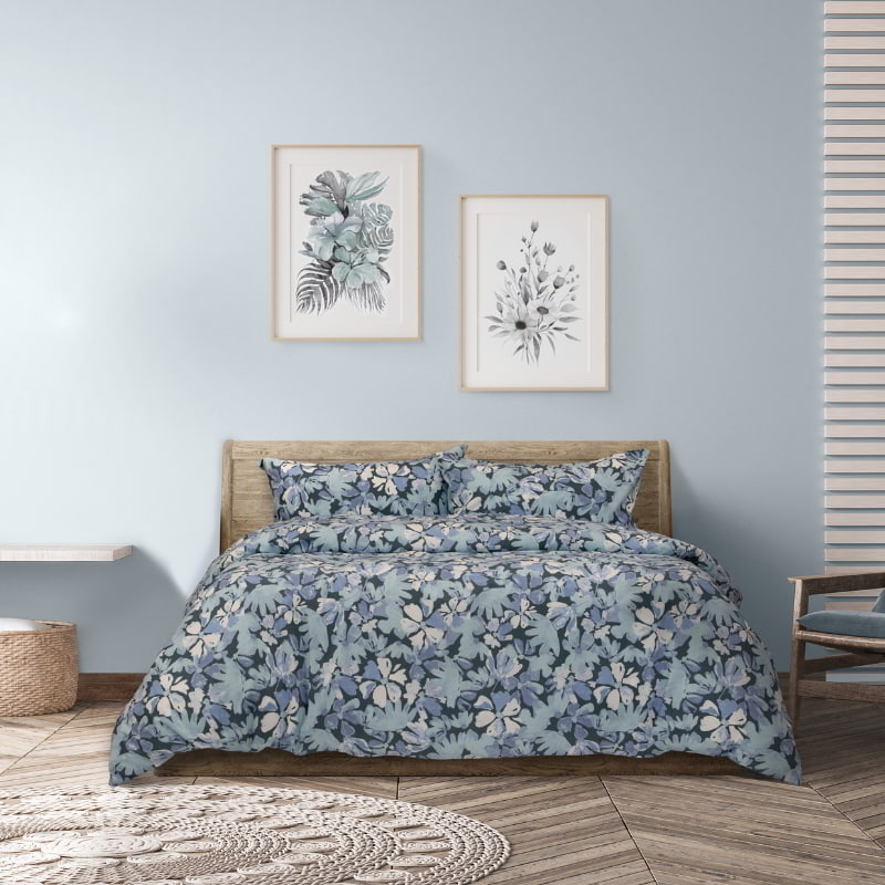 A sophisticated teal quilt cover set floral fabric, enhancing bedroom elegance with its unique layered design and soothing tones.