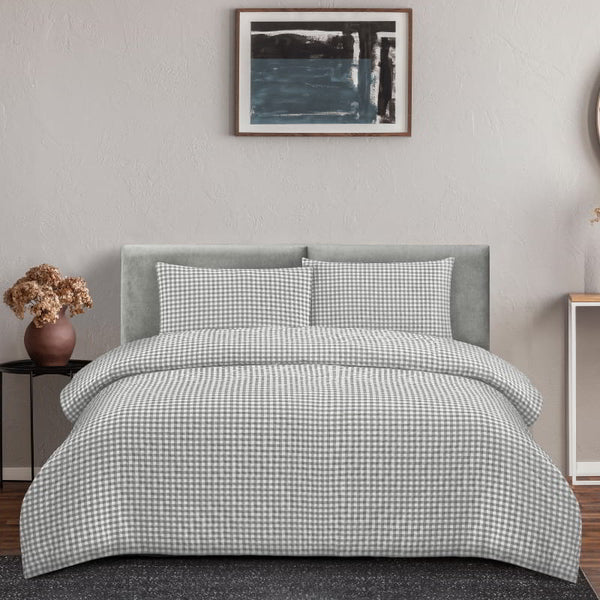 Grey checkered quilt cover set brings a warm, nostalgic touch to your bedroom, creating a cosy retreat for relaxation.