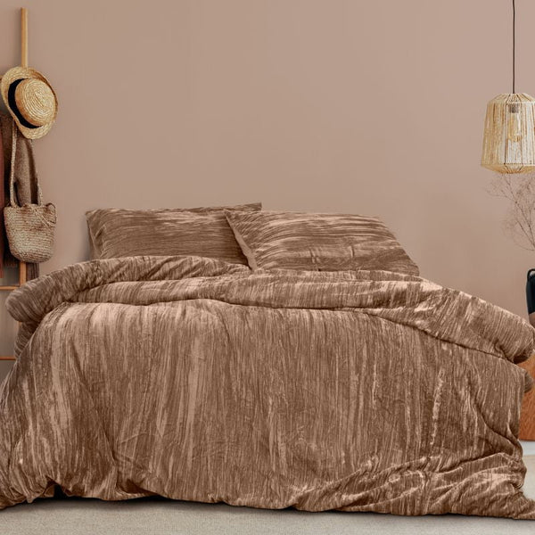 A luxurious quilt cover set exuding opulence and elegance in soft champagne tones.