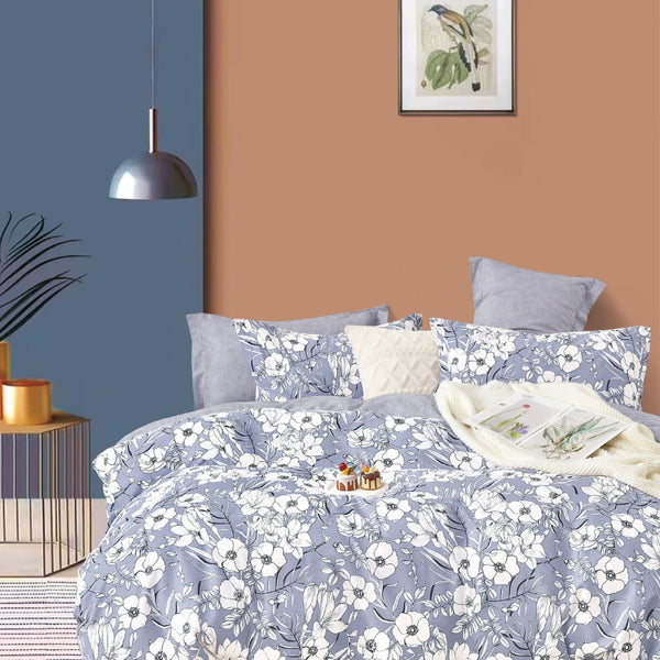 Elegant floral quilt cover set, enhancing the tranquil ambiance of the bedroom.