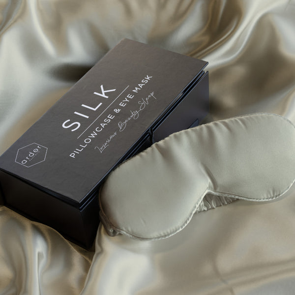 Soft gentle 100% mulberry silk eye mask as you lay on a soft silk-satin pillowcase known to be gentle on your skin.