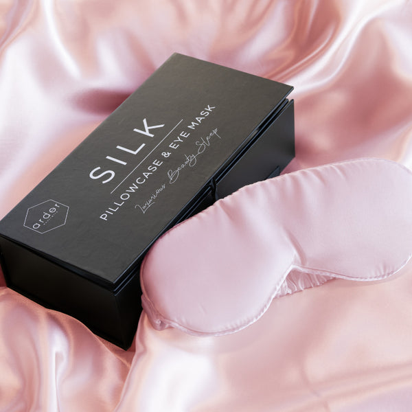 Soft gentle 100% mulberry silk eye mask as you lay on a soft silk-satin pillowcase known to be gentle on your skin.