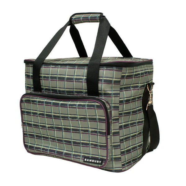 A large green cooler bag designed for picnics, featuring a waterproof interior and a zippered front pocket.