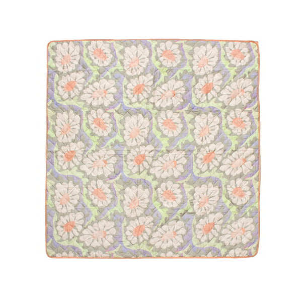 A Sadie Orange Picnic Rug featuring a vibrant floral pattern, perfect for outdoor activities and enhancing picnic experiences.