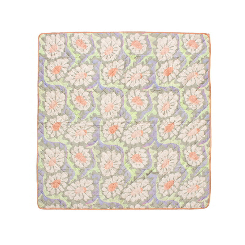 A Sadie Orange Picnic Rug featuring a vibrant floral pattern, perfect for outdoor activities and enhancing picnic experiences.