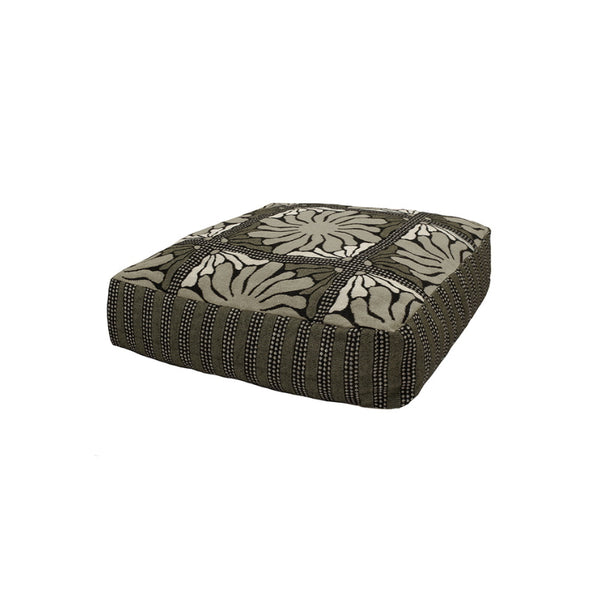 A floral-patterned floor cushion in green, perfect for extra seating or floor resting, combining comfort with stylish decor.