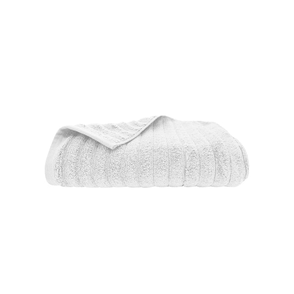 Experience luxury with the Bas Phillips Shoal Bay Ribbed White Bath Towel, offering plush comfort, superior absorbency, and elegant design.