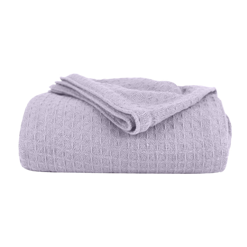 A lilac Cotton Blanket featuring its luxuriously soft and resilient Cotton with added polyester.