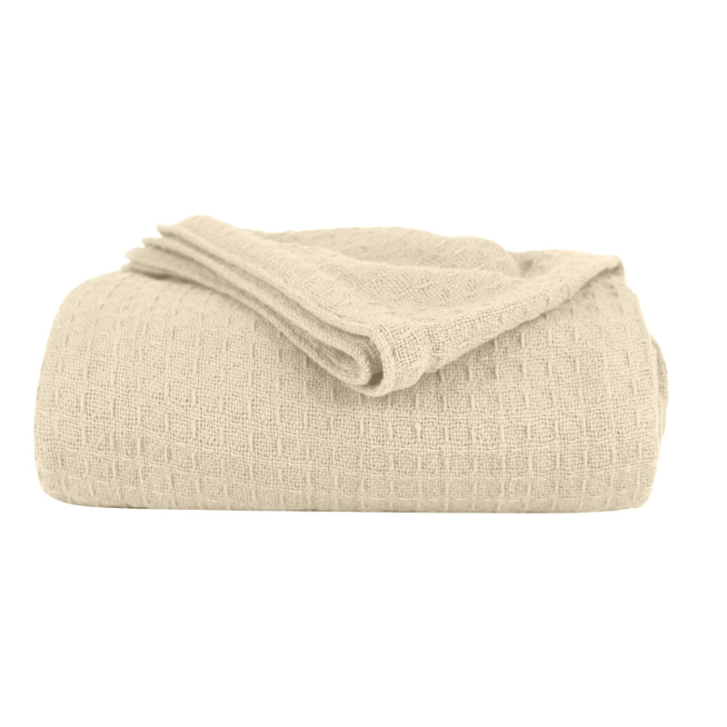 A natural Cotton Blanket featuring its luxuriously soft and resilient Cotton with added polyester.