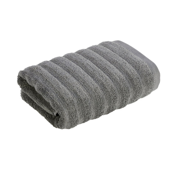 Experience the plush luxury of the Christy Kensington Charcoal Hand Towel, designed from 100% cotton for superior absorbency and style.