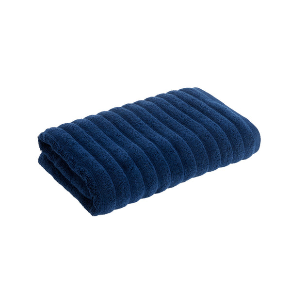 Experience everyday luxury with the Christy Kensington Navy Bath Towel, featuring plush cotton softness and exceptional absorbency.