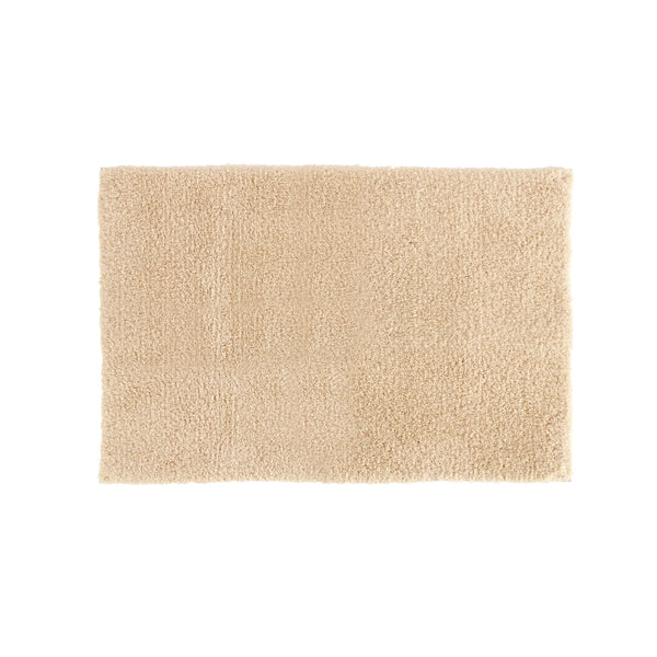 Luxurious Christy Kensington Sand Mushroom Bath Mat in pure cotton, offering plush comfort and excellent absorbency for a spa-like experience.