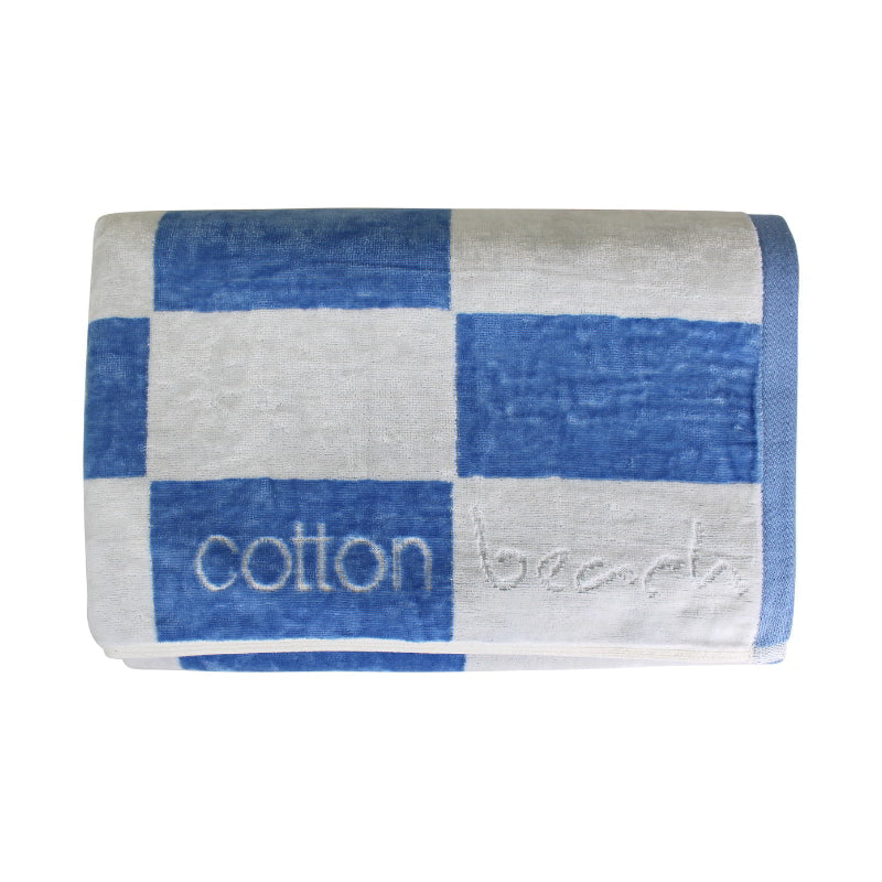 Close up details of a calming coast checkerboard design towel, ideal for a tranquil beach day experience.