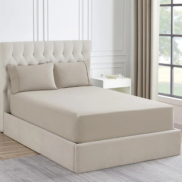 Luxurious Ddecor Home 1500 Thread Count Sand Fitted Sheet and Pillowcase Set, combining cotton and polyester for comfort and easy care to your bedroom.