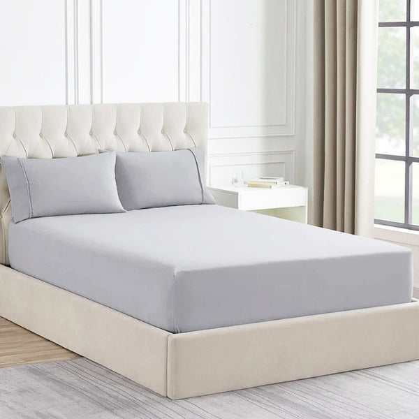 Luxurious Ddecor Home 1500 Thread Count Silver Fitted Sheet and Pillowcase Set, combining cotton and polyester for comfort and easy care to your bedroom.