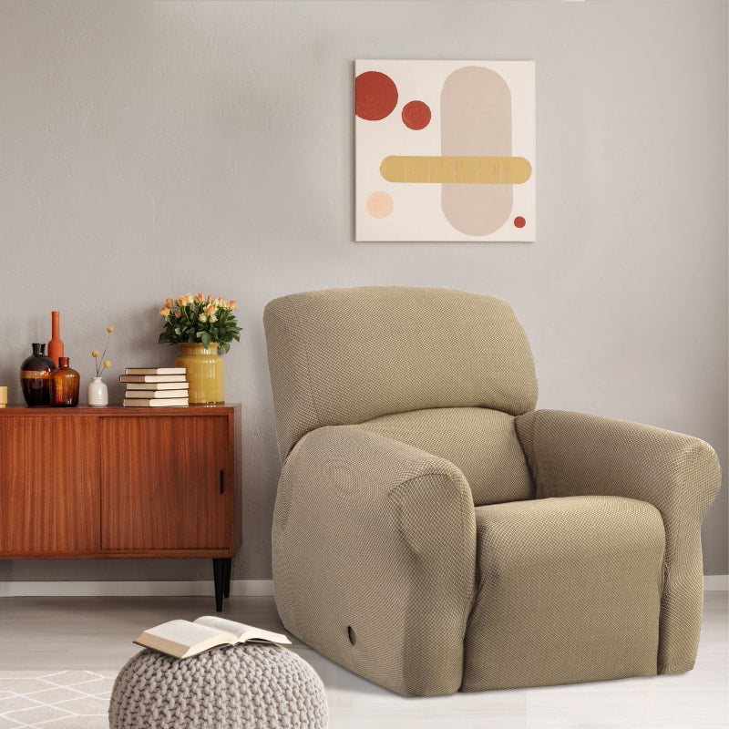 A tan recliner covered with a textured slipcover, enhancing comfort and style in a contemporary living space.