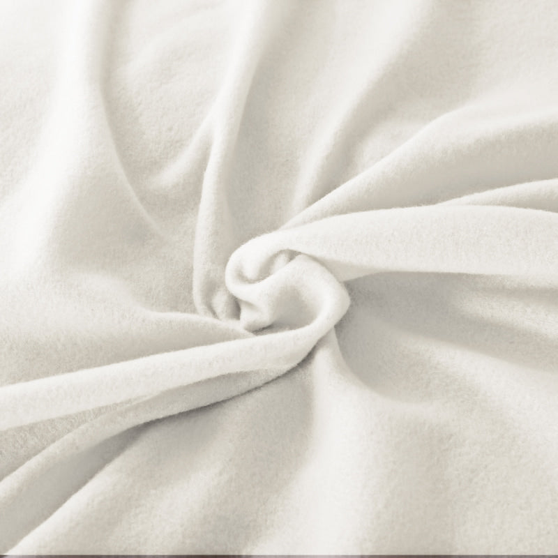 Close up details of a luxuriously white premium microflannel for a cosy haven in your bedroom.