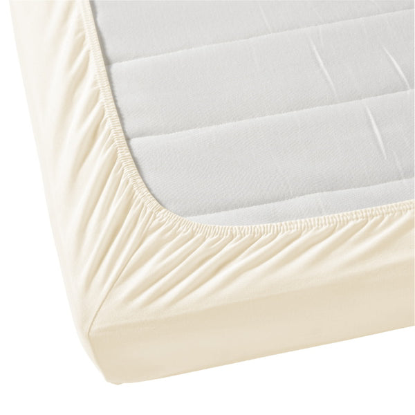 A mattress featuring the Jenny Mclean La Via Ivory Fitted Sheet, designed for comfort and enhanced sleep quality.