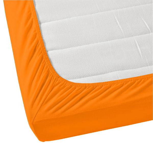 A luxurious mattress with orange fitted sheet, offering comfort and elegance for a restful night's sleep.