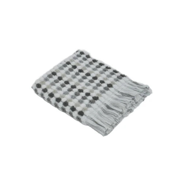 Experience the softness of the Jenny Mclean Pom Pom Grey Face Towel, crafted from 100% cotton with chic fringes for added elegance.