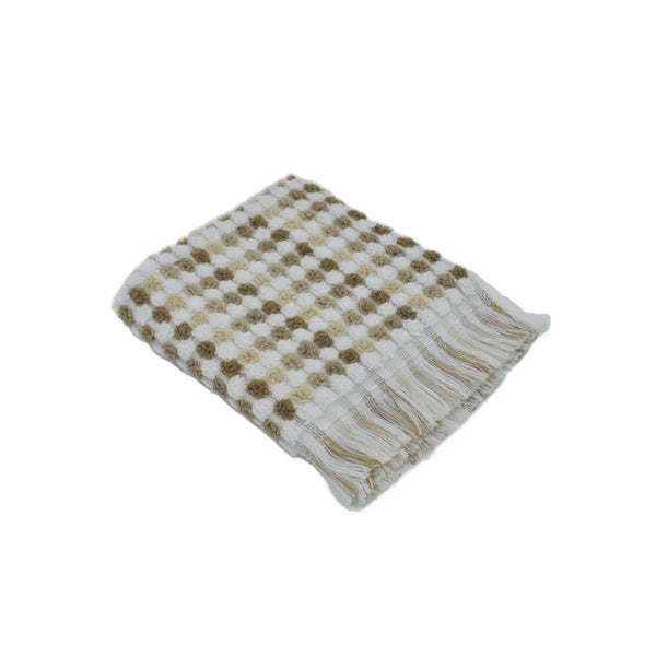 Luxurious Jenny Mclean Pom Pom Natural Face Towel in 100% cotton, featuring stylish fringes for an elegant touch in your bathroom.