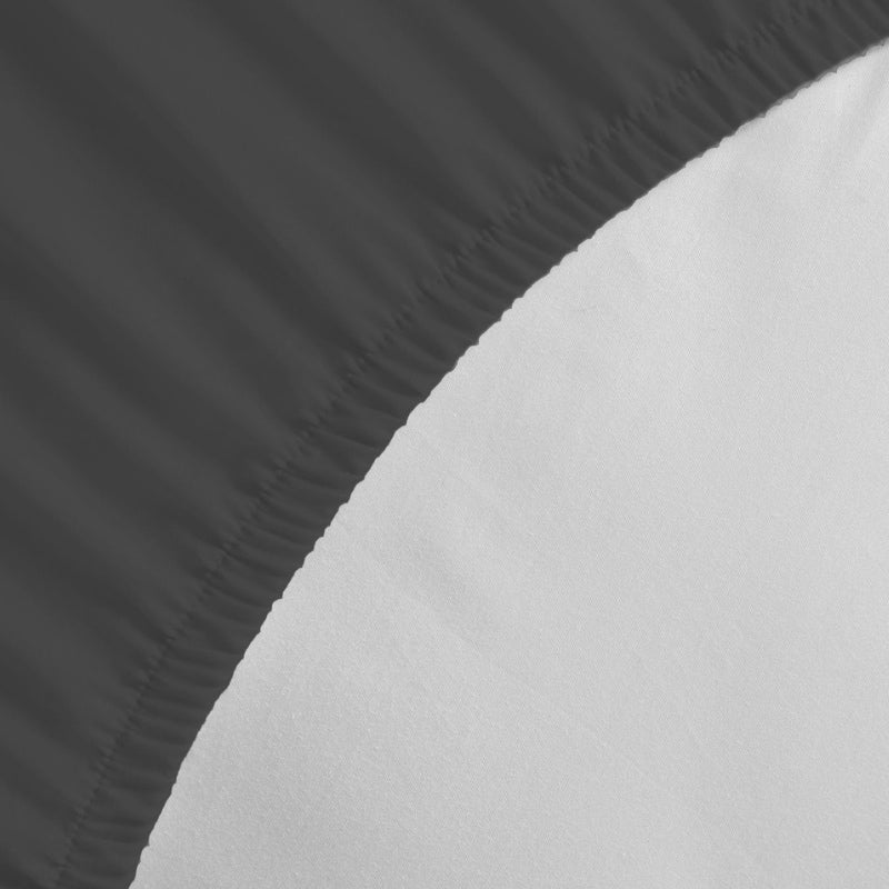 Detailed view of a Jenny Mclean Porto Granite fitted sheet, highlighting the luxurious feel of the cotton fabric.