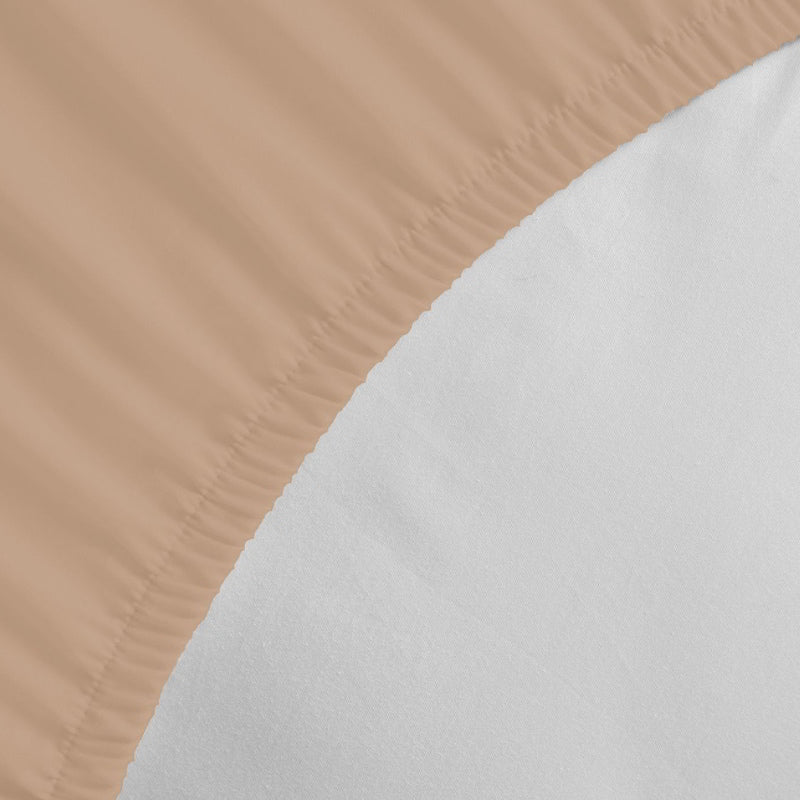 Detailed view of a Jenny Mclean Porto Linen fitted sheet, highlighting the luxurious feel of the cotton fabric.