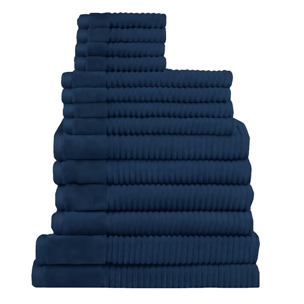 Fourteen plush navy towels arranged in a stack, highlighting their softness and absorbency, ideal for enhancing daily rituals.