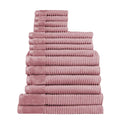 Fourteen plush rosebud towels arranged in a stack, highlighting their softness and absorbency, ideal for enhancing daily rituals.