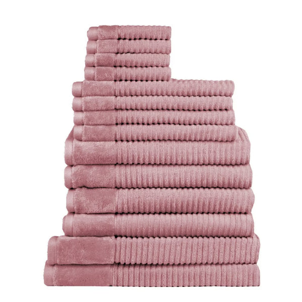 Fourteen plush rosebud towels arranged in a stack, highlighting their softness and absorbency, ideal for enhancing daily rituals.