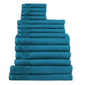 Fourteen plush teal towels arranged in a stack, highlighting their softness and absorbency, ideal for enhancing daily rituals.