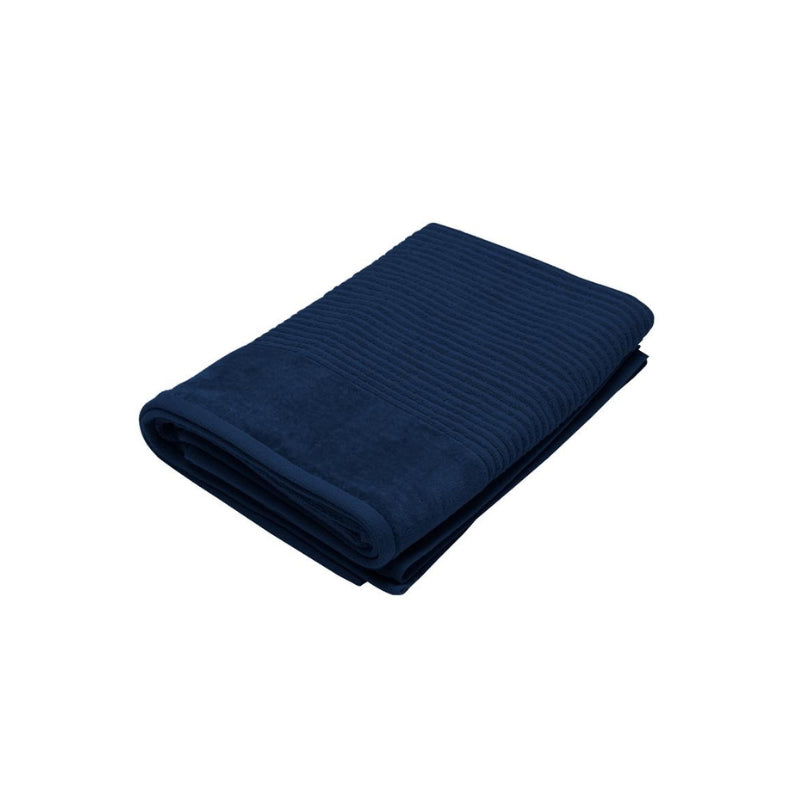 A luxurious navy bath sheet against a white backdrop, highlighting its absorbent and durable cotton material.