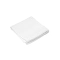 A folded white face towel on a white background, showcasing its luxurious softness and absorbent quality for ultimate comfort.