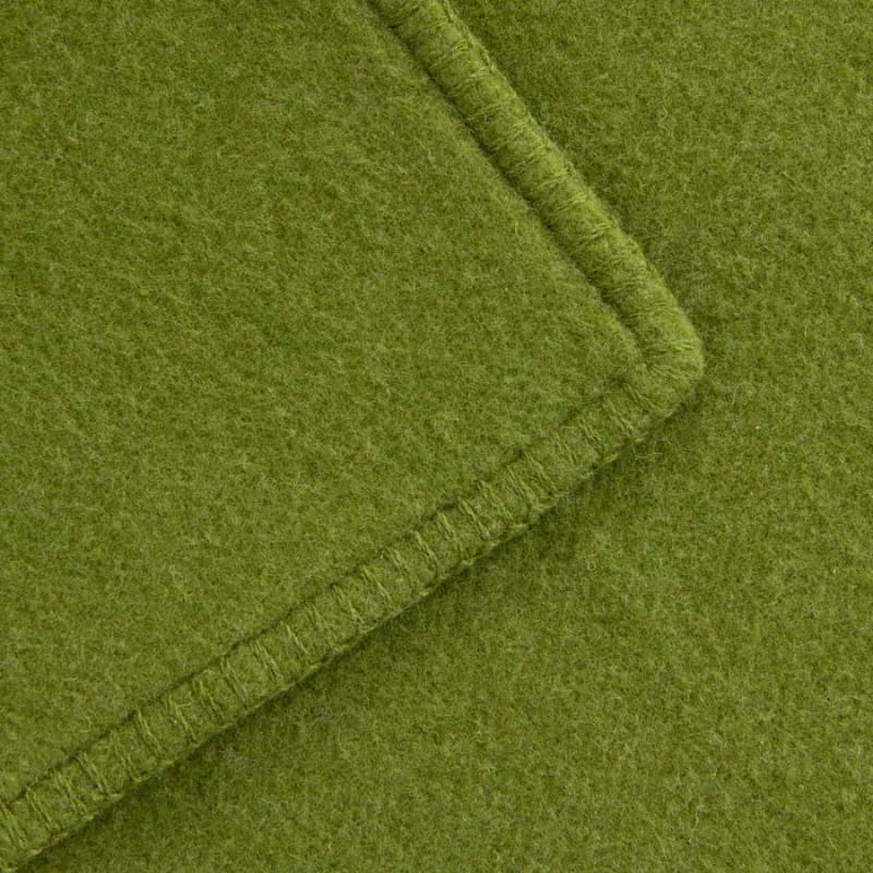 Close up detail of the moss green blanket of Laconia that is made from premium Australian pure new wool.