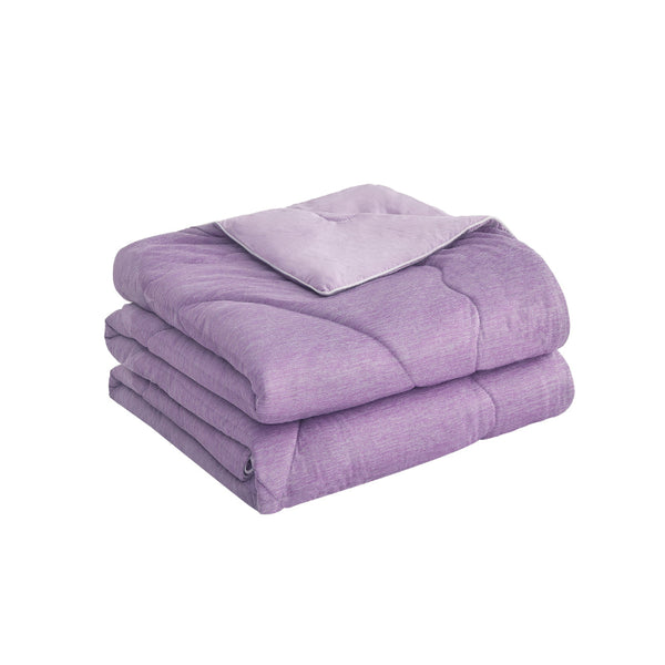 A purple blanket with two neatly folded blankets, showcasing for a refreshing sleep experience.