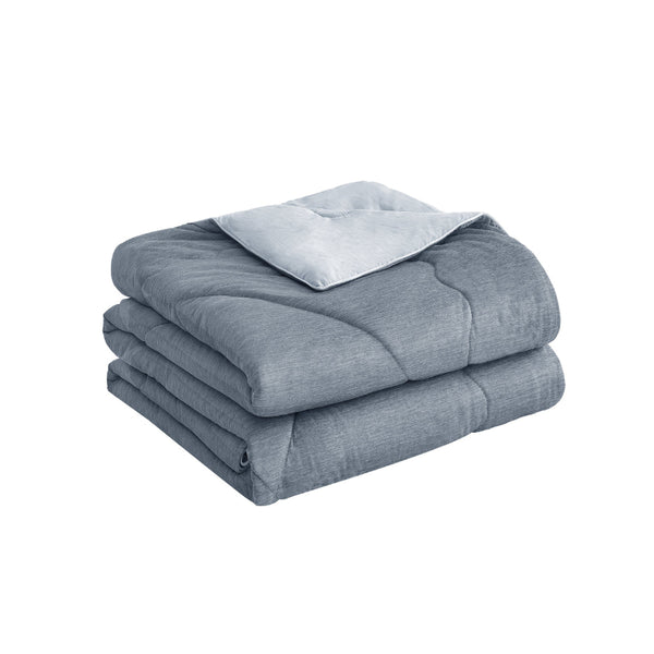 A grey blanket with two neatly folded blankets, showcasing for a refreshing sleep experience.