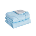 A blue blanket with two neatly folded blankets, showcasing for a refreshing sleep experience.