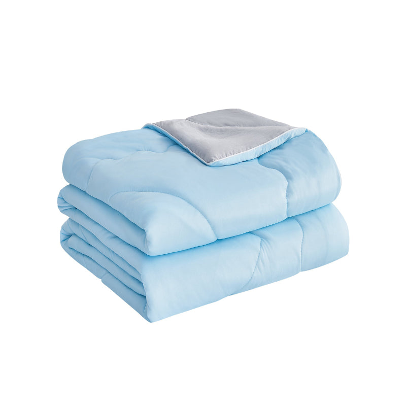 A blue blanket with two neatly folded blankets, showcasing for a refreshing sleep experience.