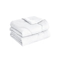 A white blanket with two neatly folded blankets, showcasing for a refreshing sleep experience.