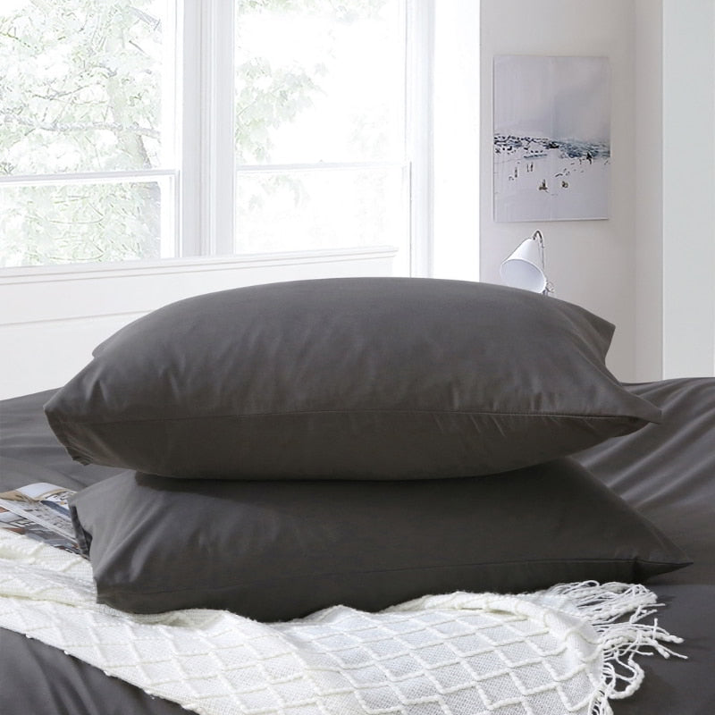 alt="Hypoallergenic and naturally anti bacterial grey queen pillowcase crafted from a soft 100% polyester"