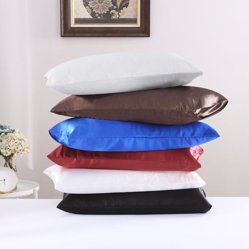 Other set of six colourful pillows stacked together, featuring the luxurious Silky-smooth Texture Standard Pillowcase from Linenova for a comfortable sleep.