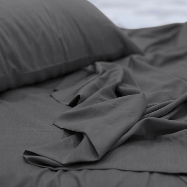 A luxuriously soft to touch bamboo and polyester blend sheet set in charcoal.