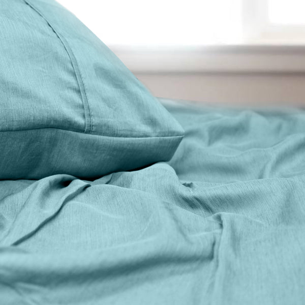 A luxuriously soft to touch bamboo and polyester blend sheet set in light aqua.