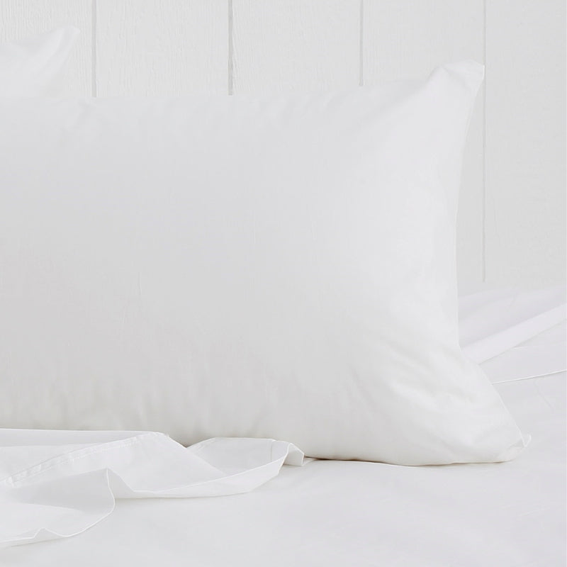 A white breathe cotton standard pillowcase featuring its minimal, inviting softness and comfort.