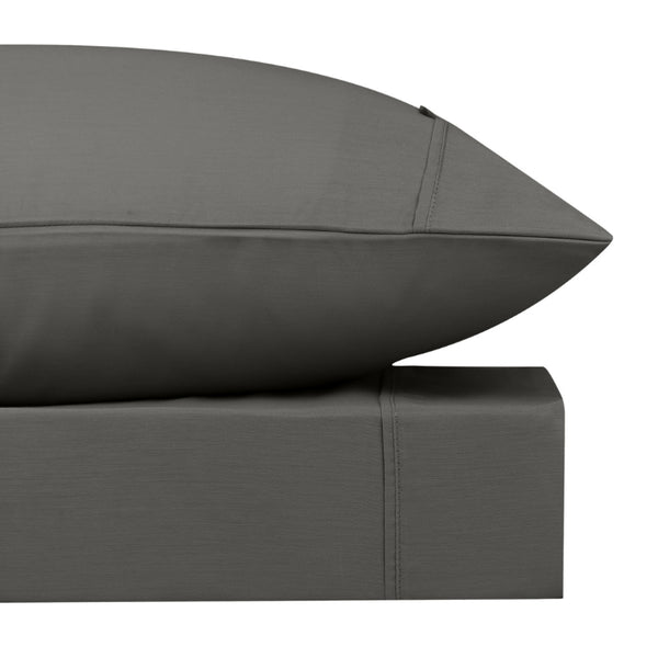 Close-up look of a charcoal sheet set featuring its softness cotton and durability of polyester comfort for a restful night's sleep.