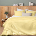 Luxurious quilt cover set in a yellow colour scheme featuring a modern texture.