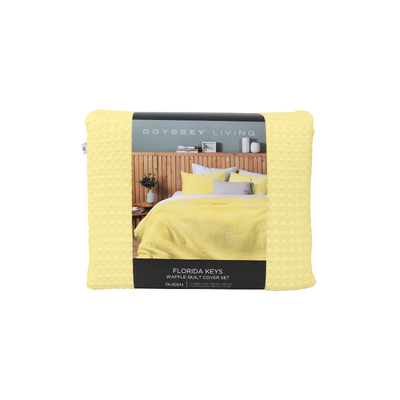 Front packaging details of a luxurious quilt cover set in a yellow colour scheme featuring a modern texture.